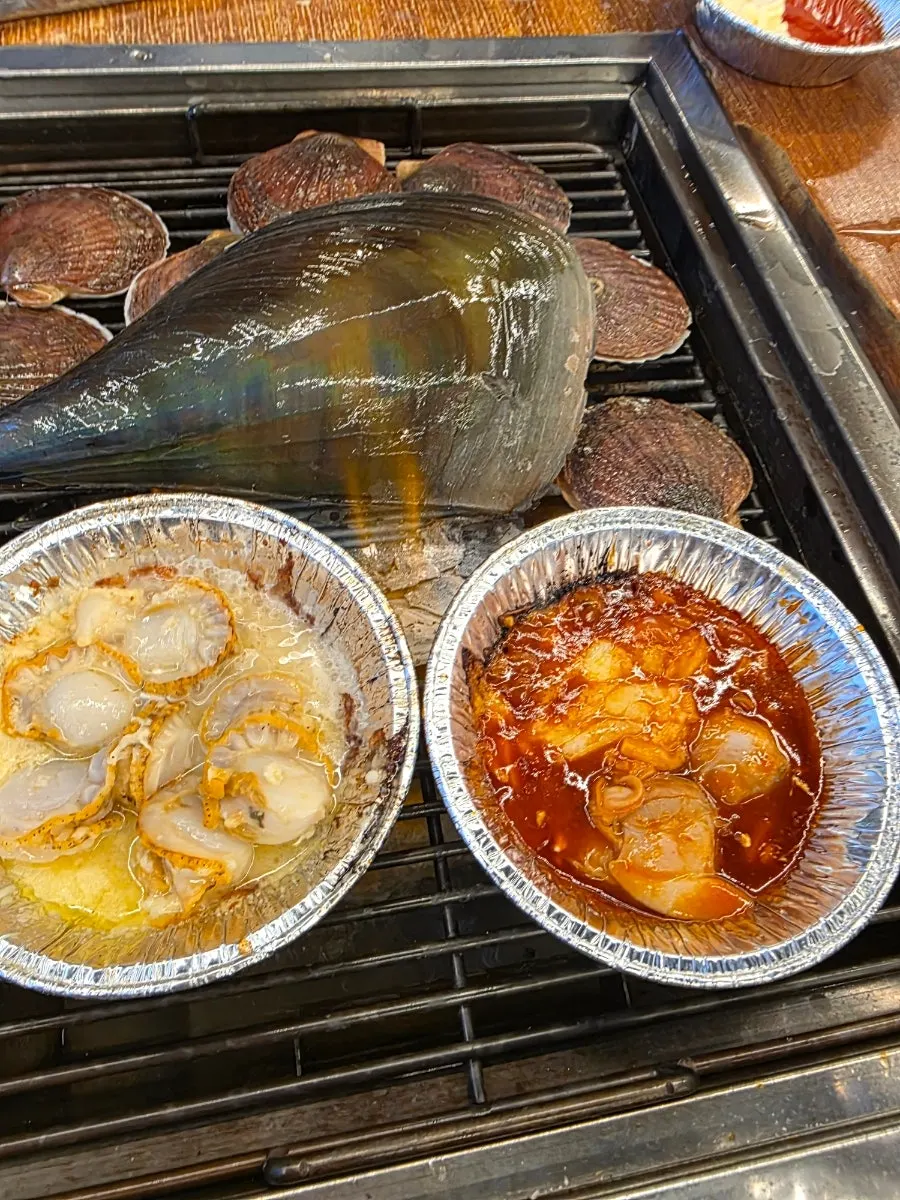 Hand-picked scallops, abalone, and razor clams