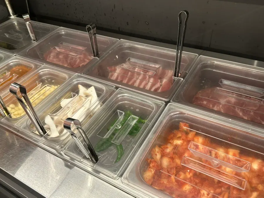 Self-serve meat bar with pork belly, pork shoulder and beef brisket