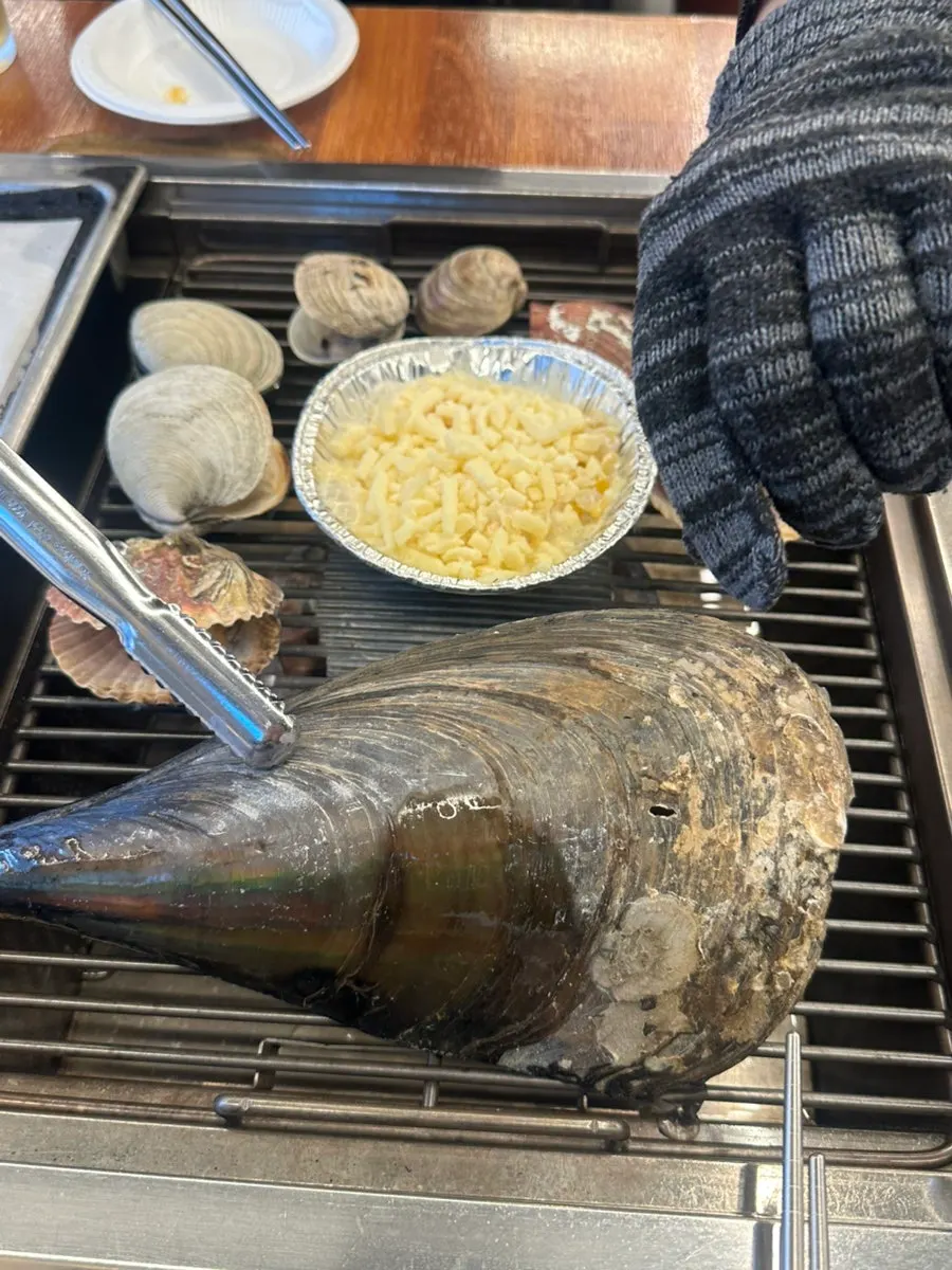 Plate of shellfish before hitting the grill