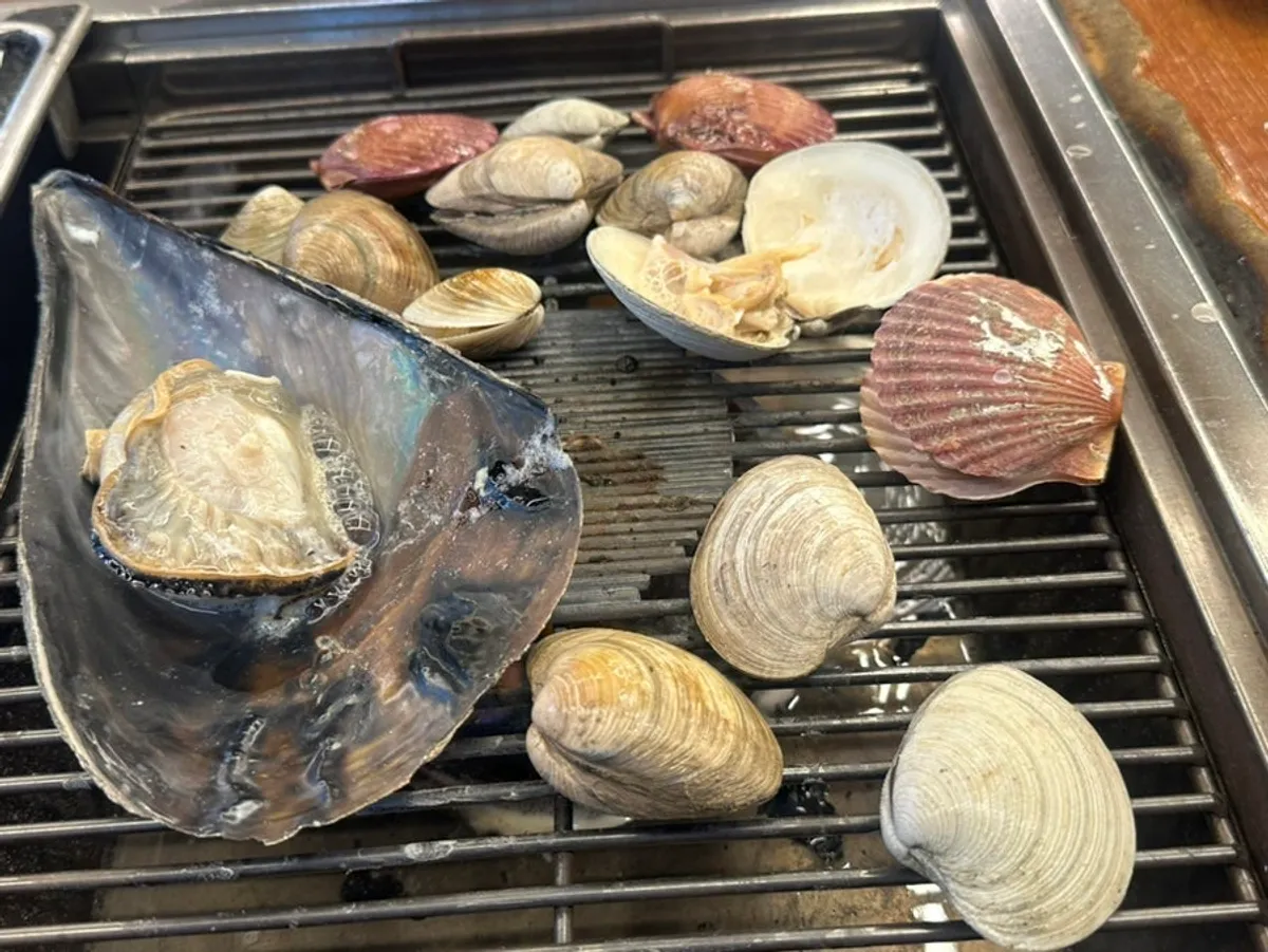 Plump grilled scallops