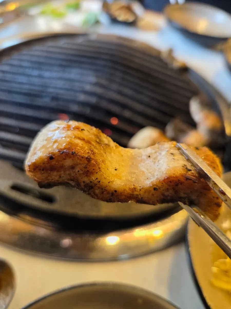 A chewy, well-cooked piece of duck neck