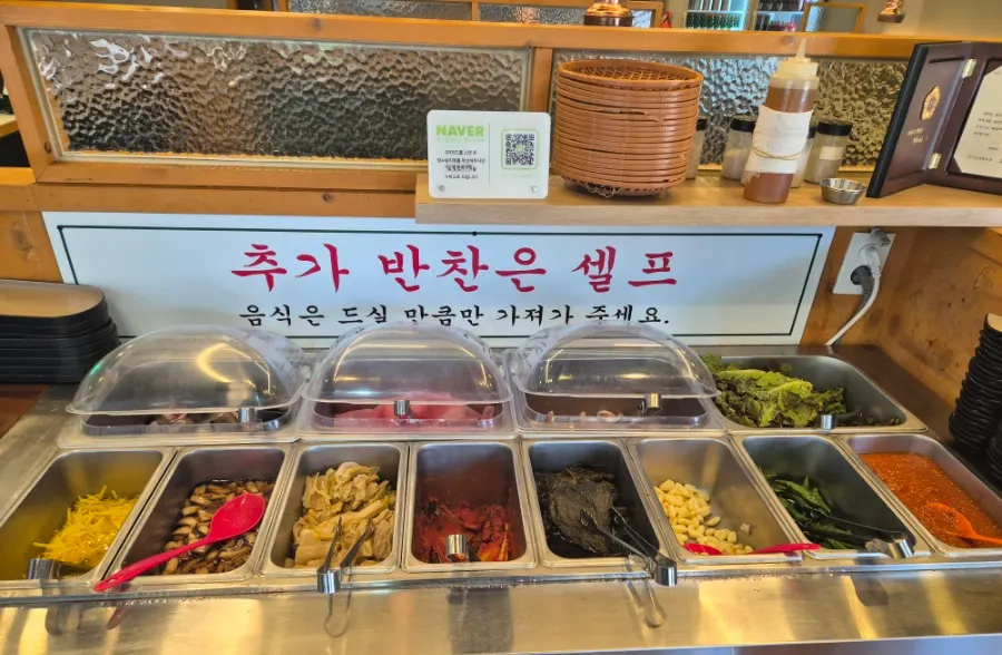 Self-service corner with eel and meats laid out