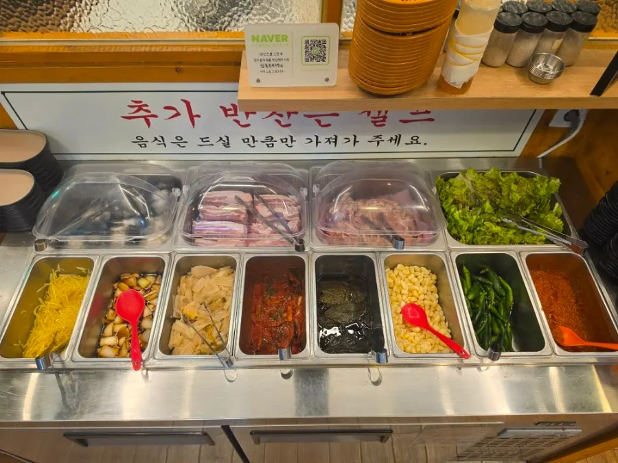 Basic banchan spread including pickled onion and white kimchi