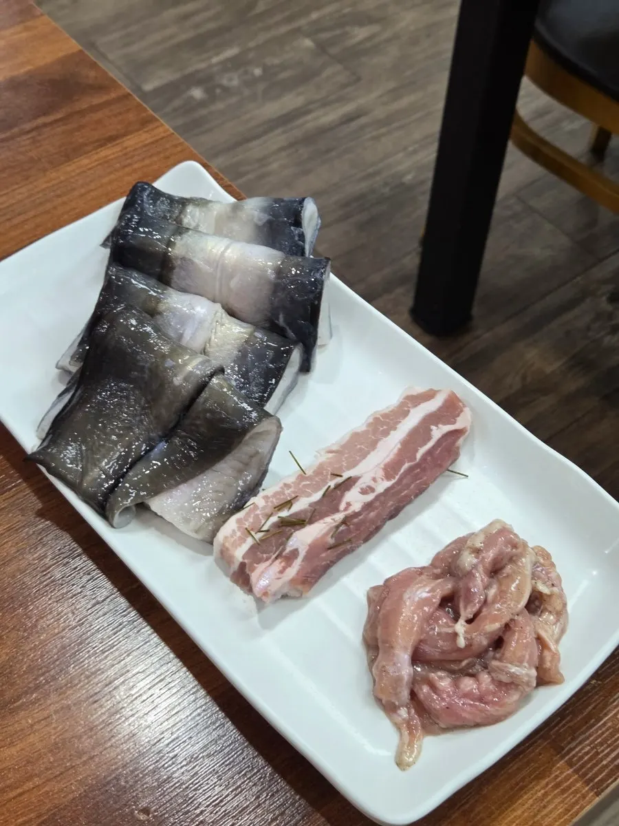 Plate of freshwater eel and meat as part of the initial setting