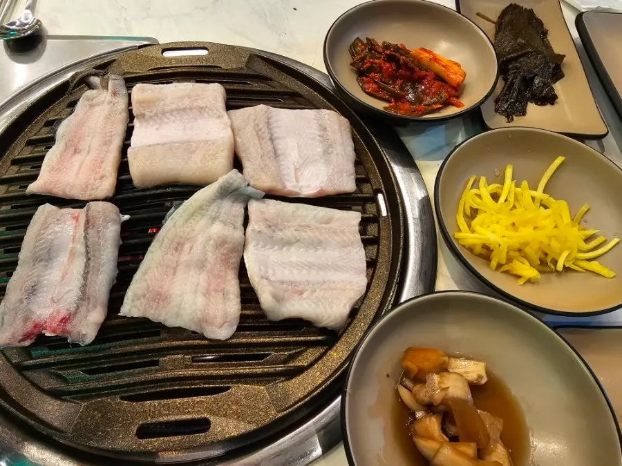 First serving of freshwater eel, pork belly, and duck neck meat