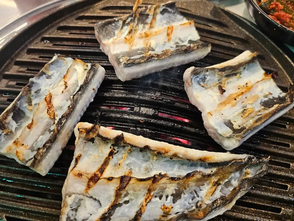 Freshwater eel covering the grill