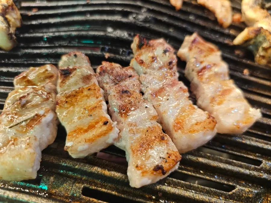 Grill full of cooked freshwater eel