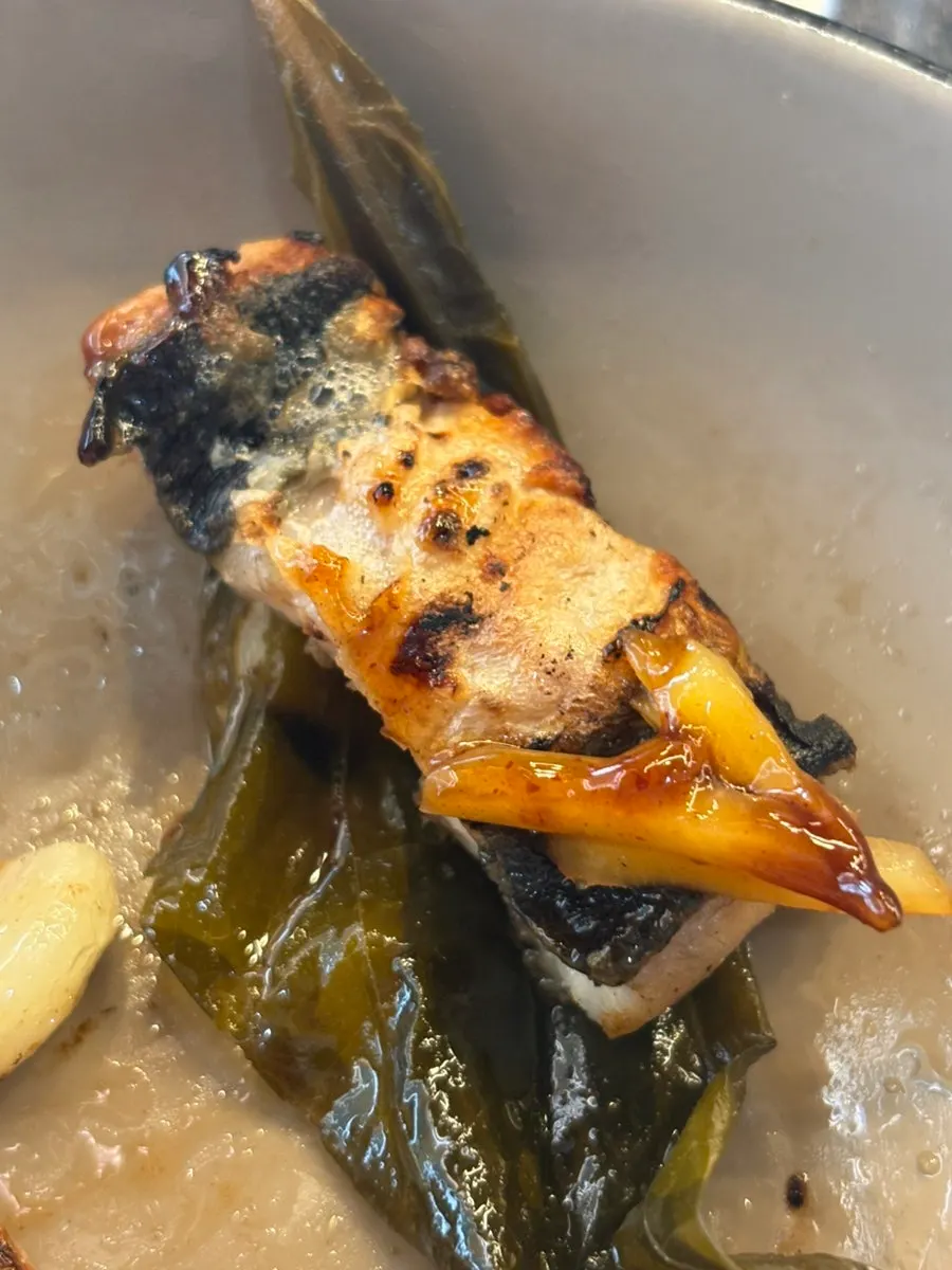 A refilled plate of eel and meat from the self-bar
