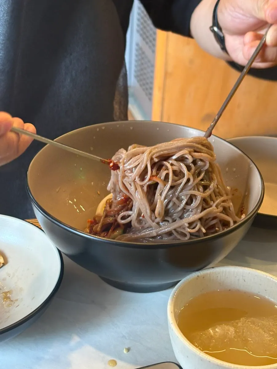A bowl of bibim makguksu before mixing