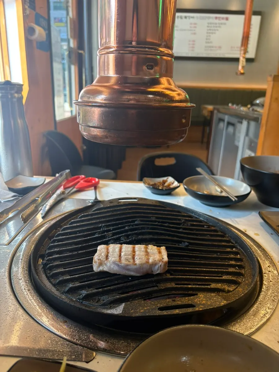 Meat wrapped with baek-kimchi on top