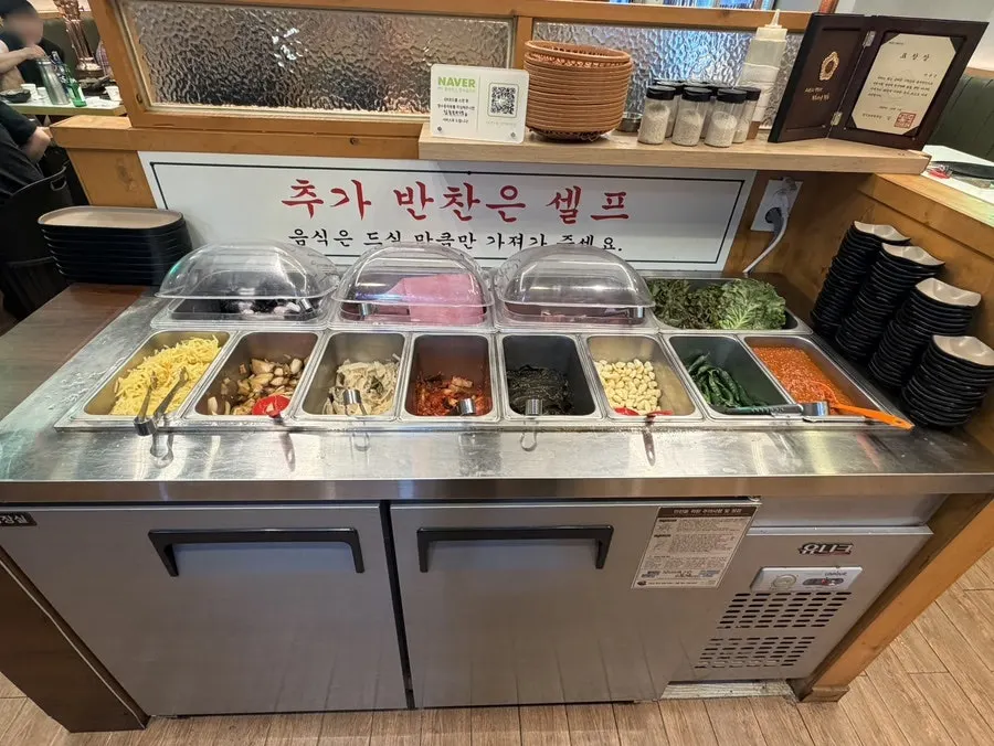 Fresh freshwater eel laid out at the self-serve bar