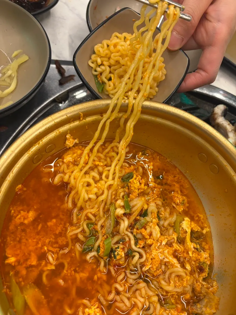 Wrapping meat and condiments in a perilla leaf
