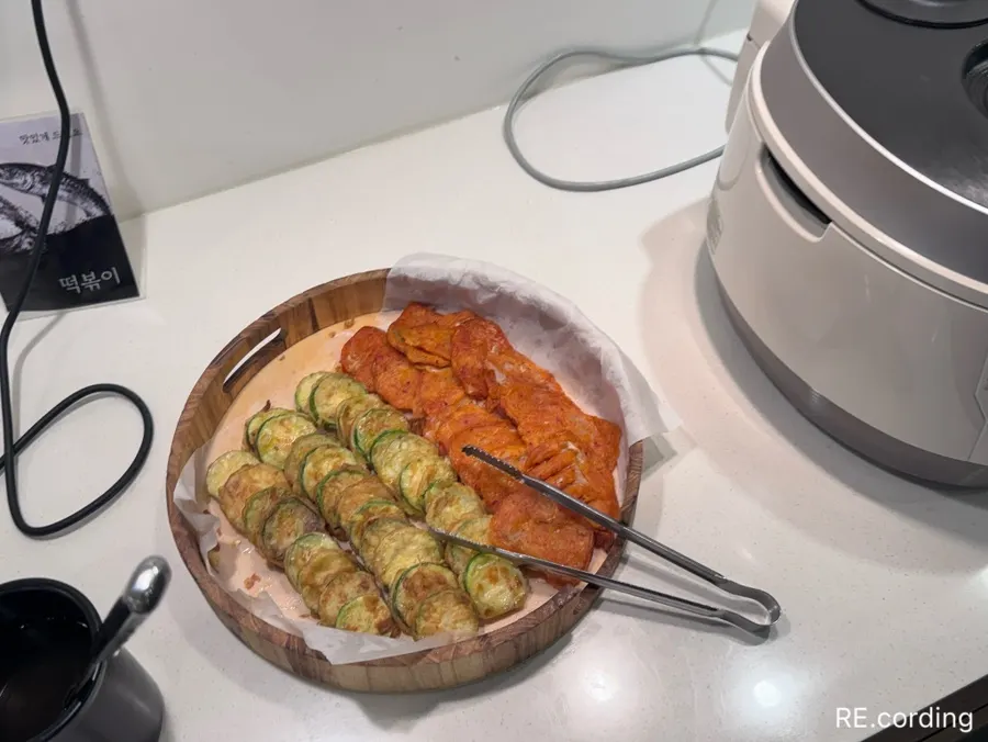 Tteokbokki plated at the table