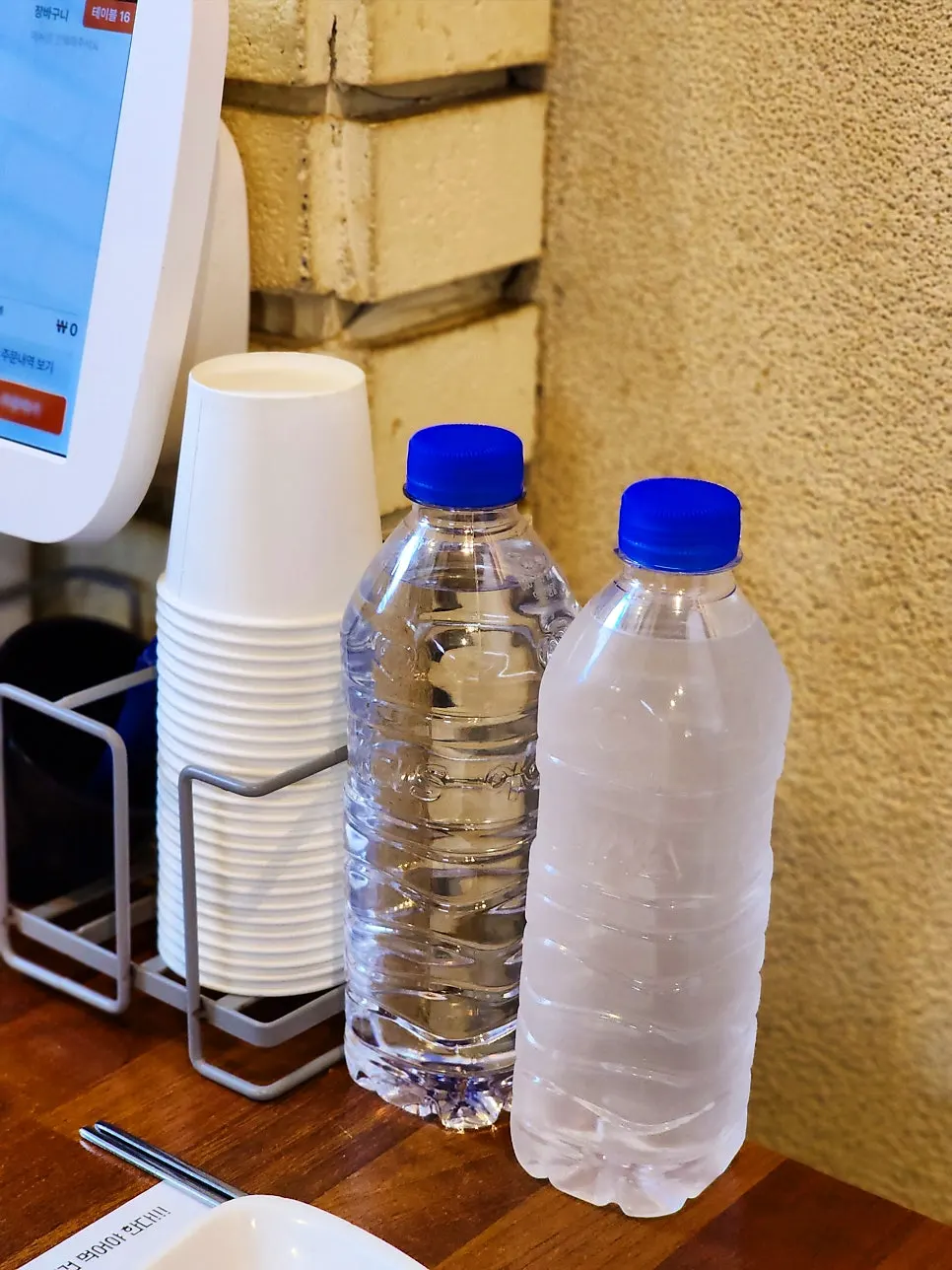 Spring water and ice water on a Korean BBQ table