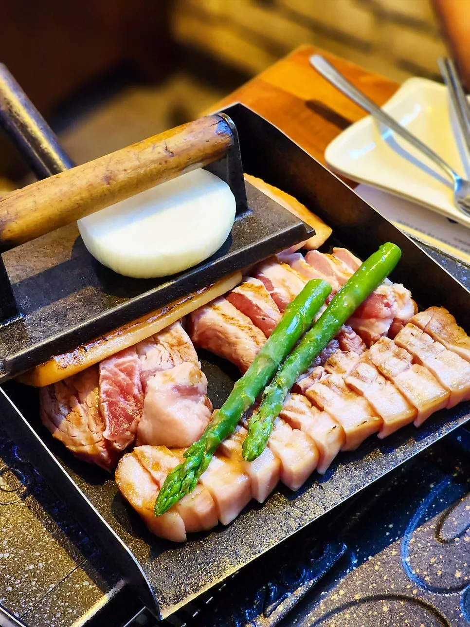 Meat placed on the grill before cooking