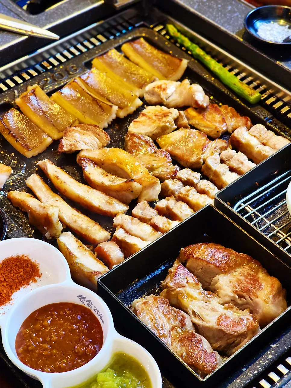 Meat cooking on the grill