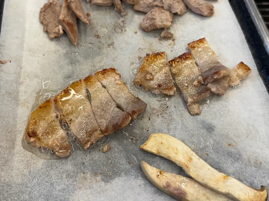 Pork belly and draft beer on the grill