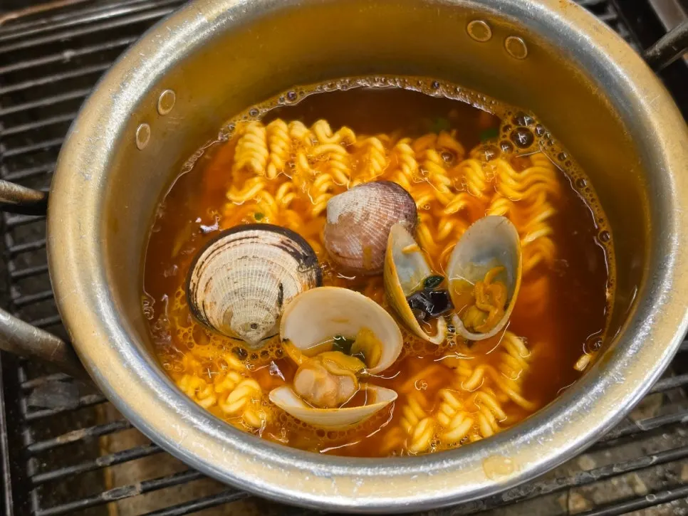 Ramen cooked in shellfish broth to finish