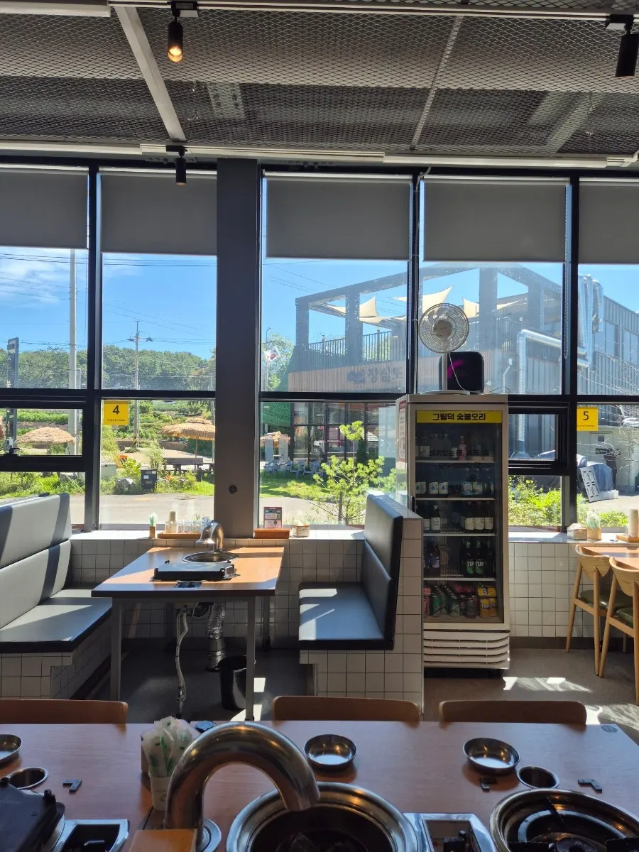 Spacious interior with floor-to-ceiling windows
