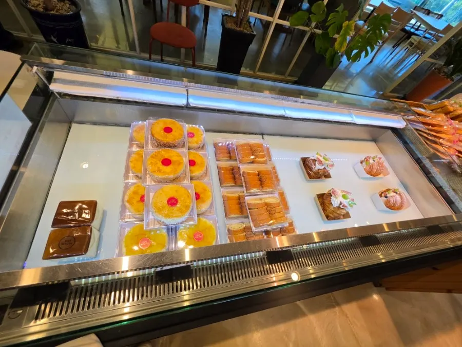 Full view of the bakery display at Flowerpot Cafe