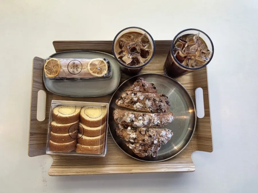 Coffee and several desserts arranged on a tray