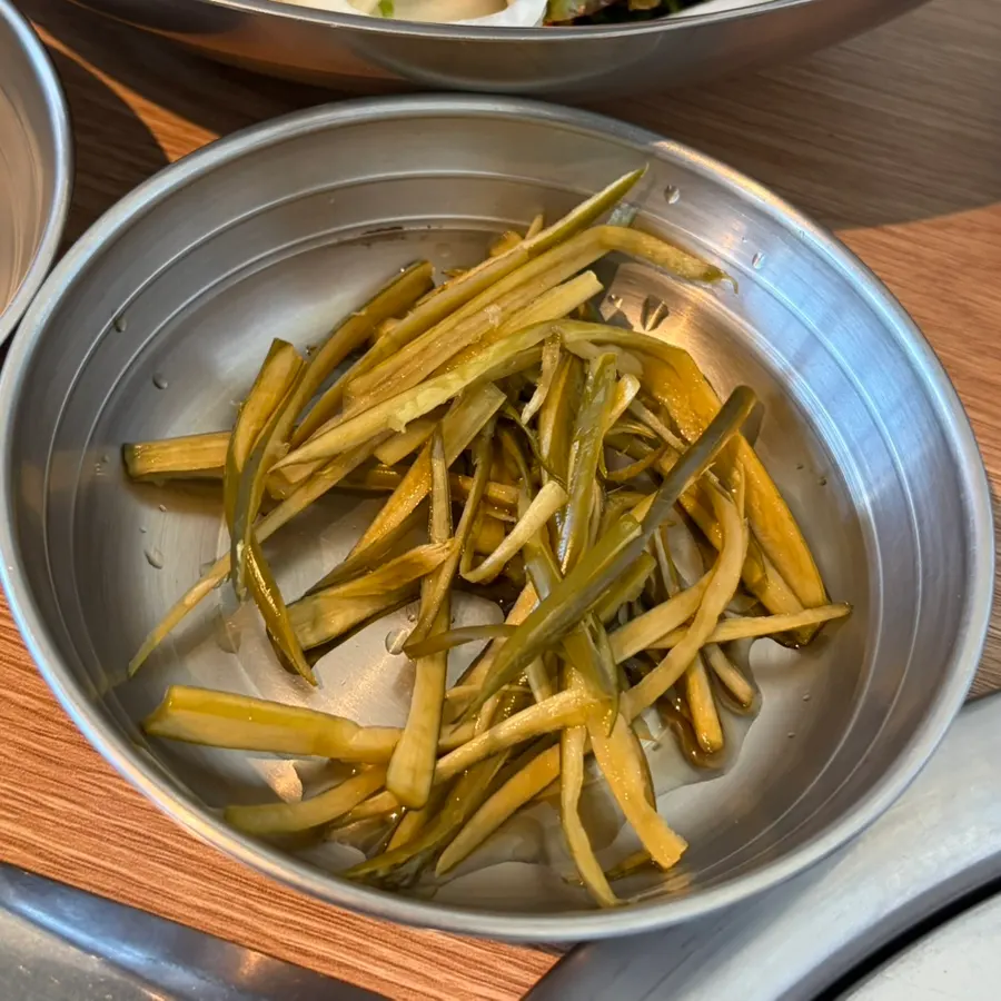 Spread of side dishes at Grill Duck