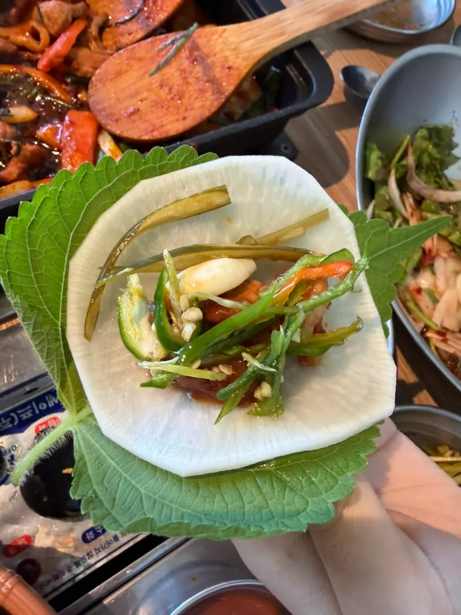 Marinated duck cooking on the grill