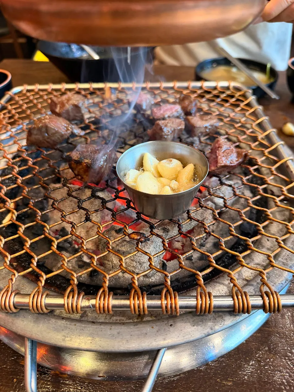 Photo related to wrapping up a charcoal-grilled meat meal
