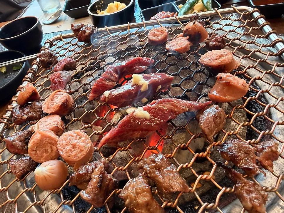 Photo related to wrapping up a charcoal-grilled meat meal