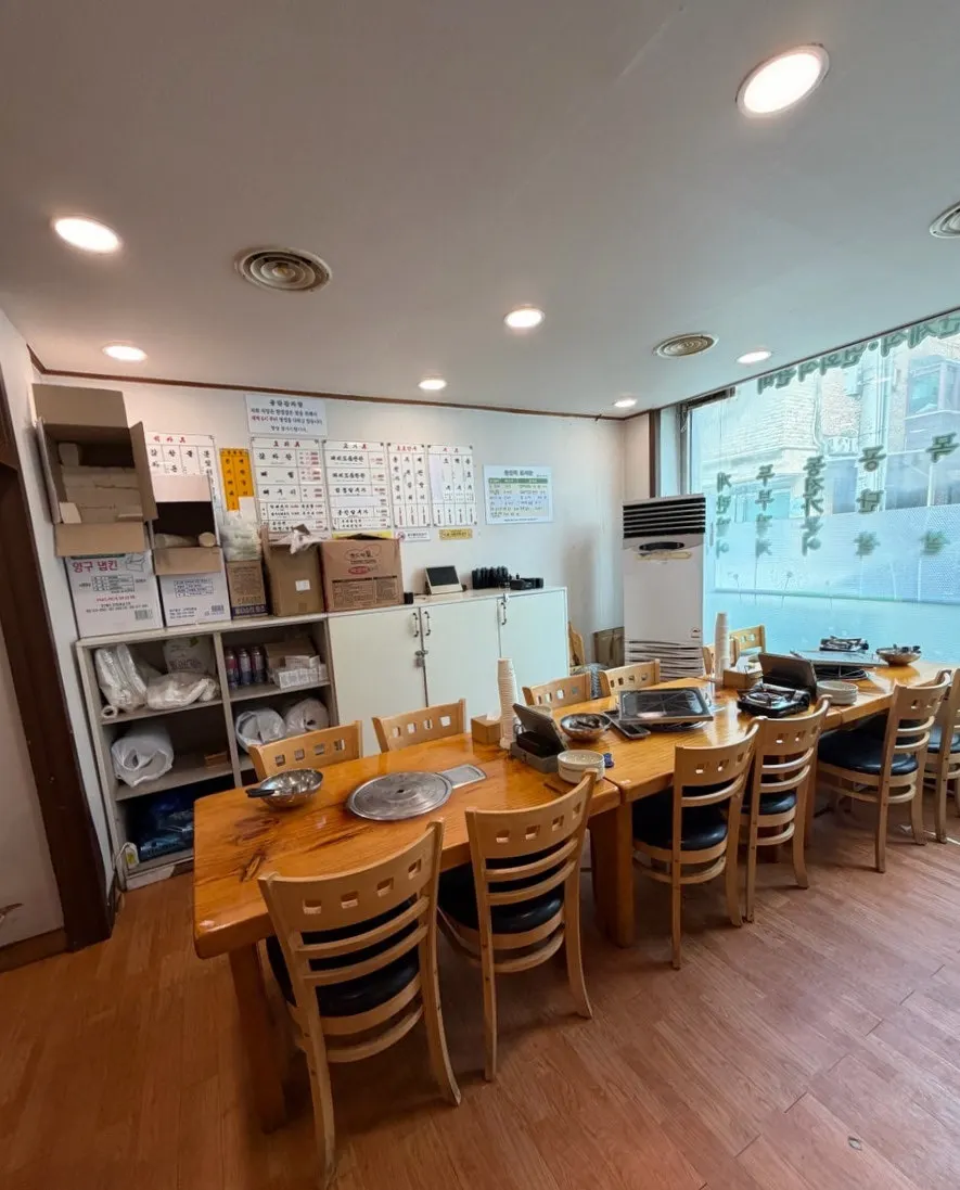 Butcher-shop-style meat display area in the restaurant