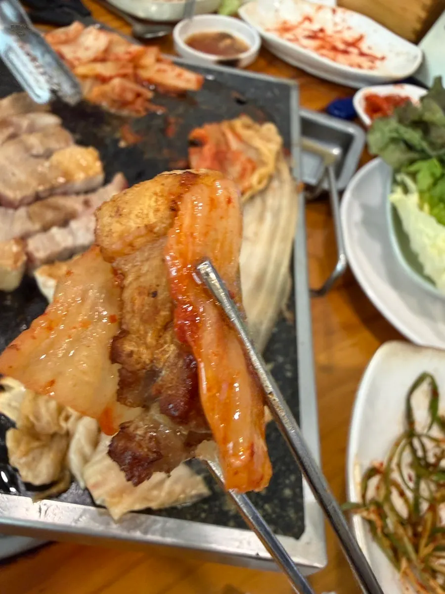 Samgyeopsal cooking on the grill