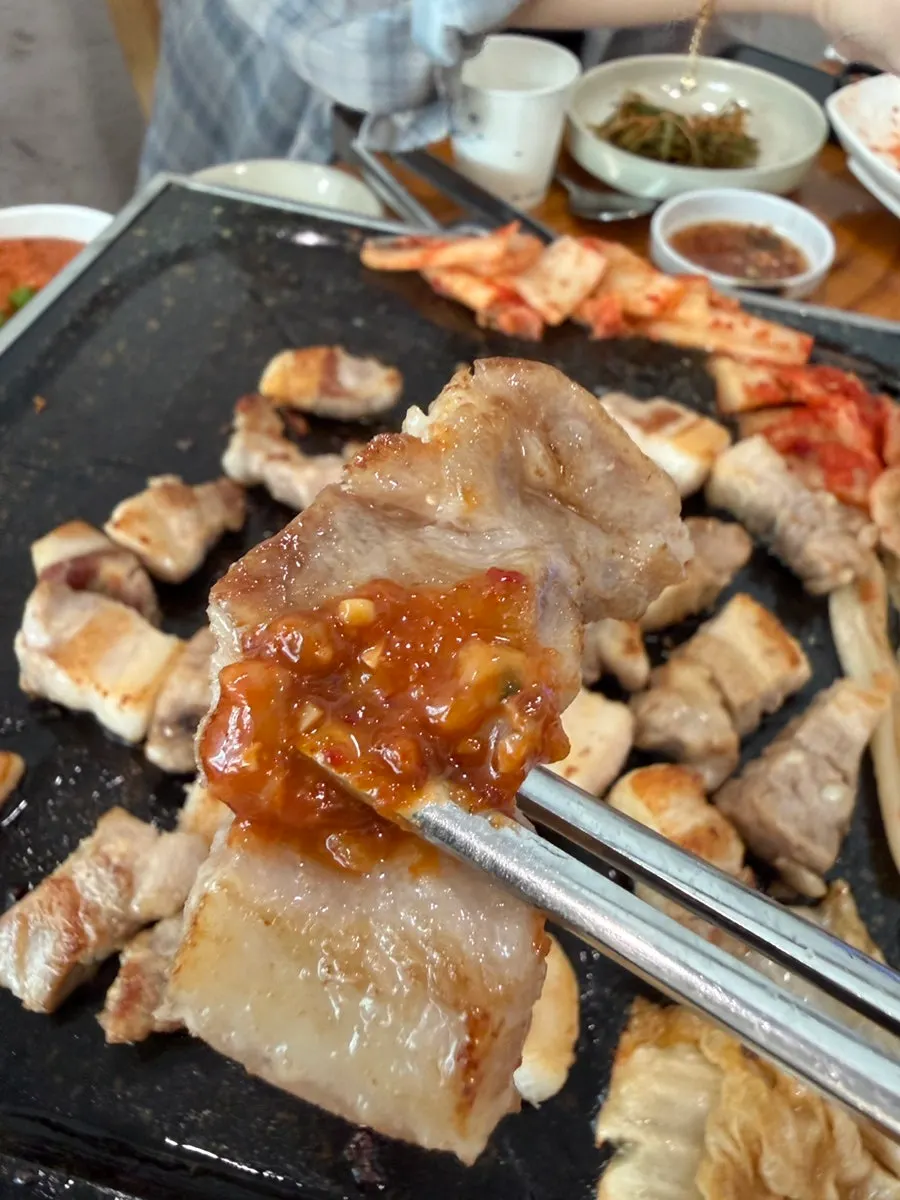 Grill piled high with mixed pork cuts