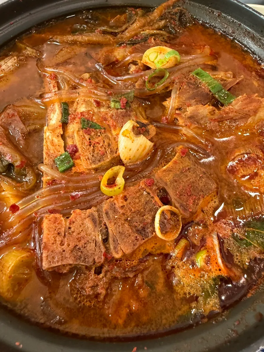 Spicy oyster jeotgal served with samgyeopsal