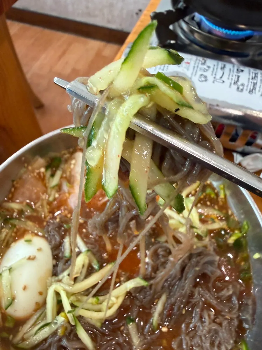 Bowl of spicy seasoned stir-fried pork