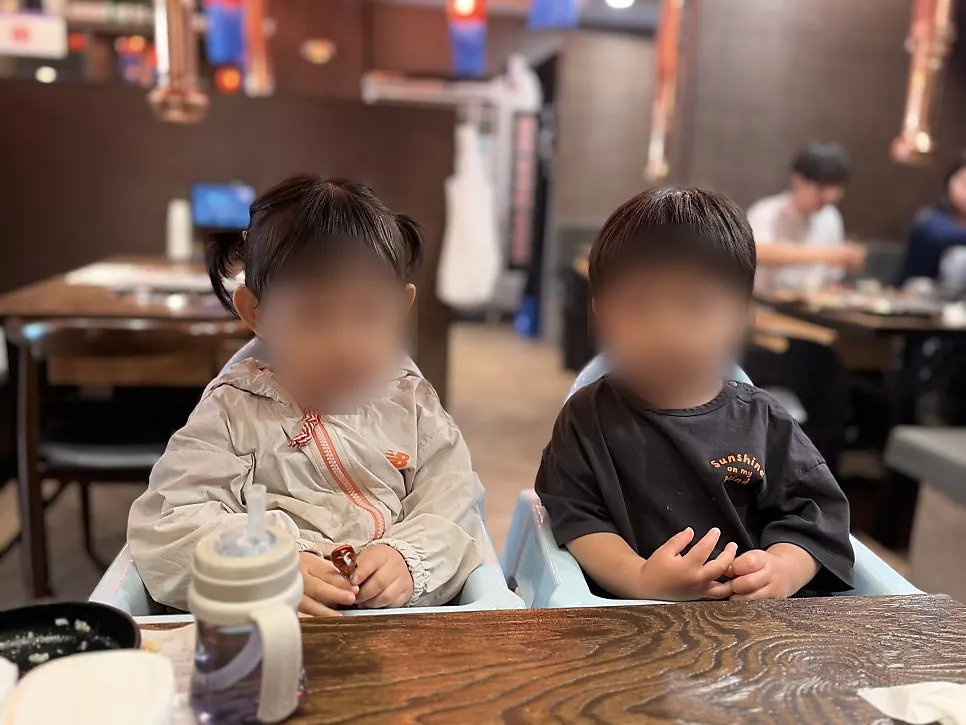 Baby with a serious expression after the meal
