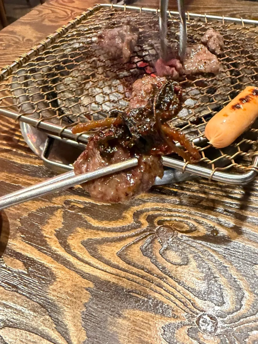 Handmade sausage and meat cooked over charcoal