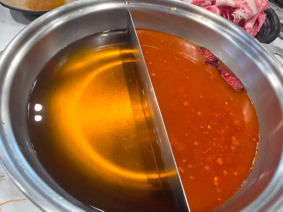 Two broths: spicy mushroom and bonito
