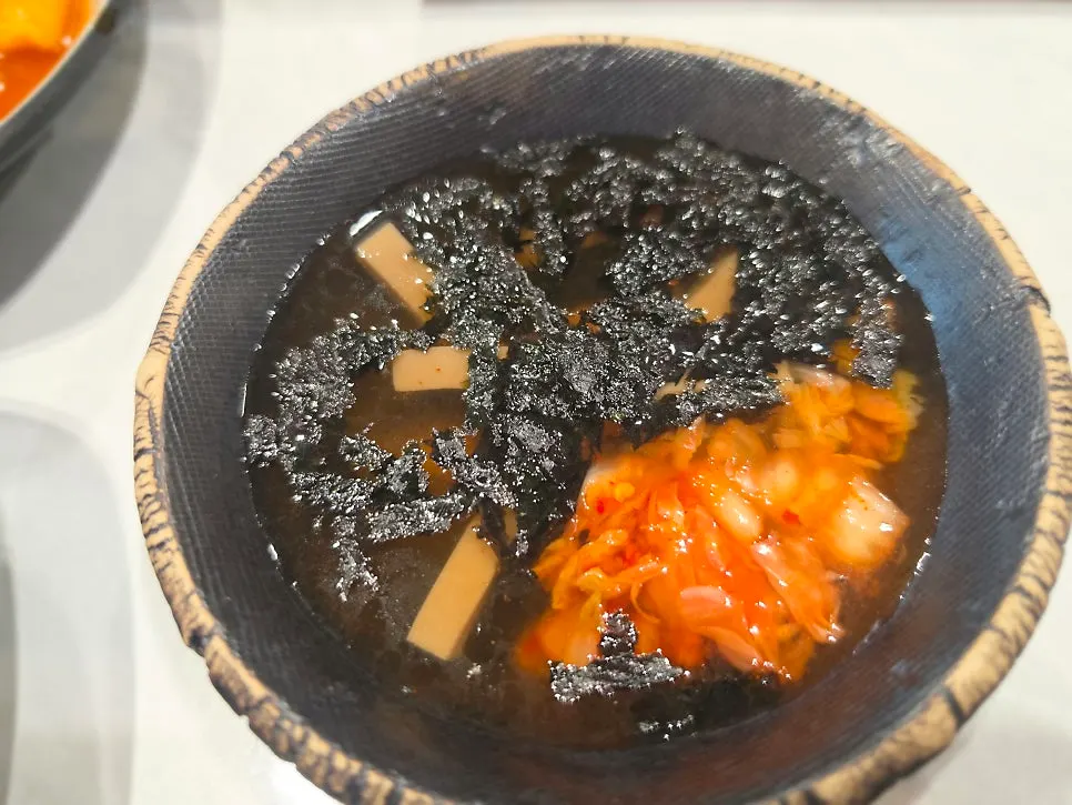Self-service bar with tteokbokki and fried items