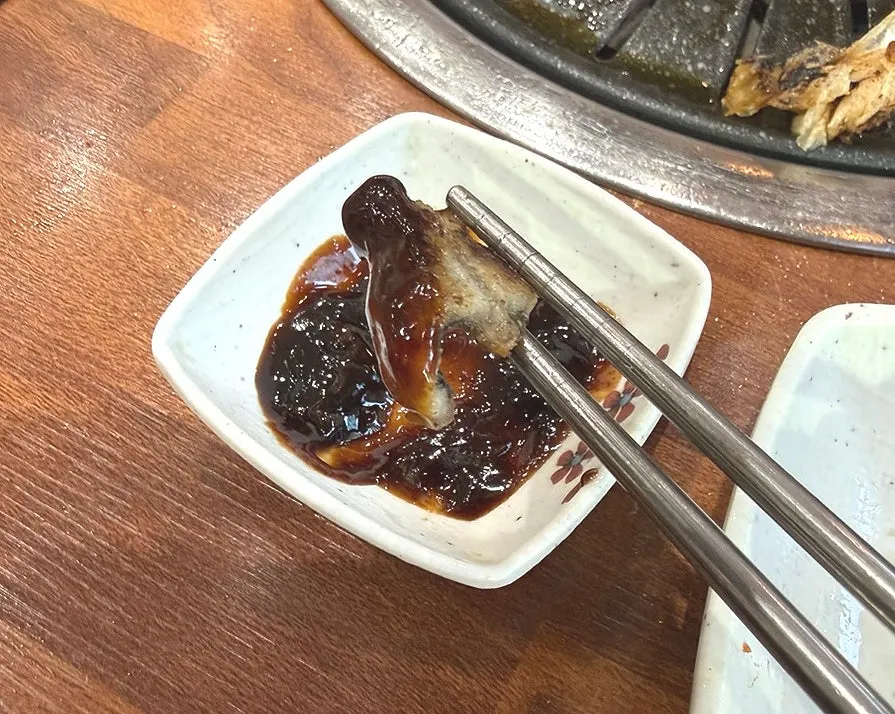 A fresh refill of eel and meat brought from the self-serve bar