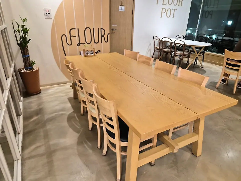 Spacious café interior with wood-toned decor