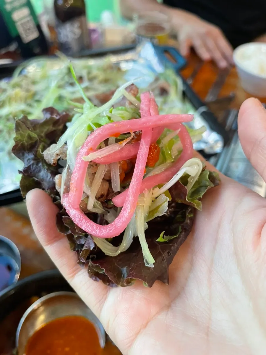 A bite of scallion bulgogi picked up