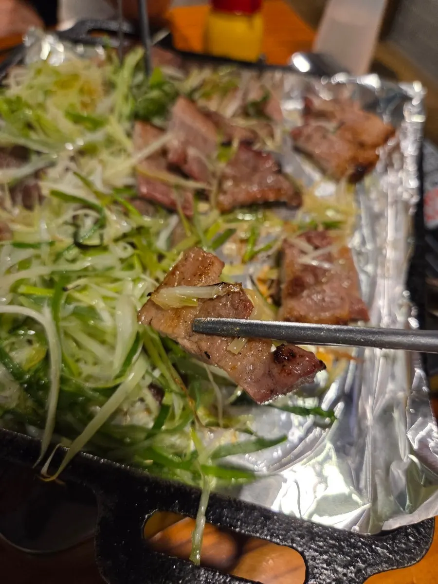 Close-up of pork belly with charcoal smoke flavor
