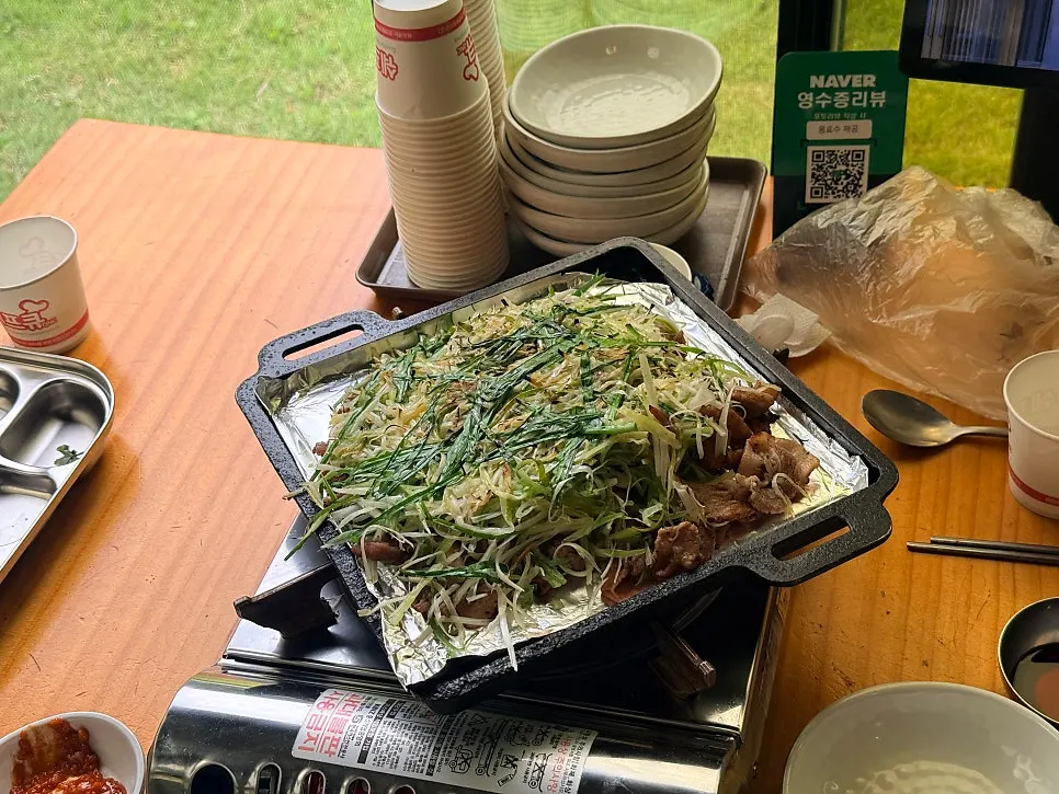 A plate of charcoal scallion bulgogi that looks like a scallion pancake