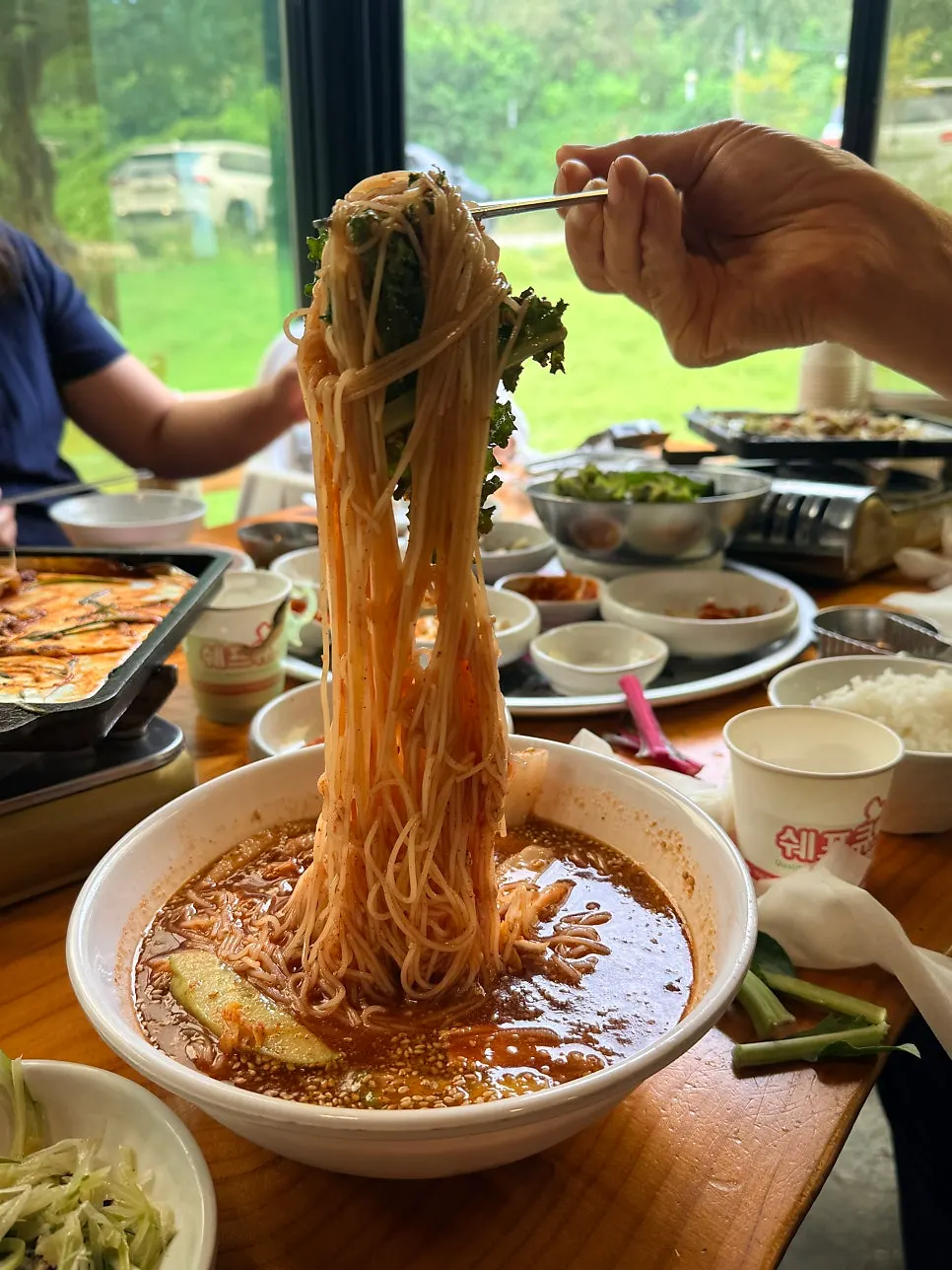 Bulhyangjip's bibim noodles served with broth