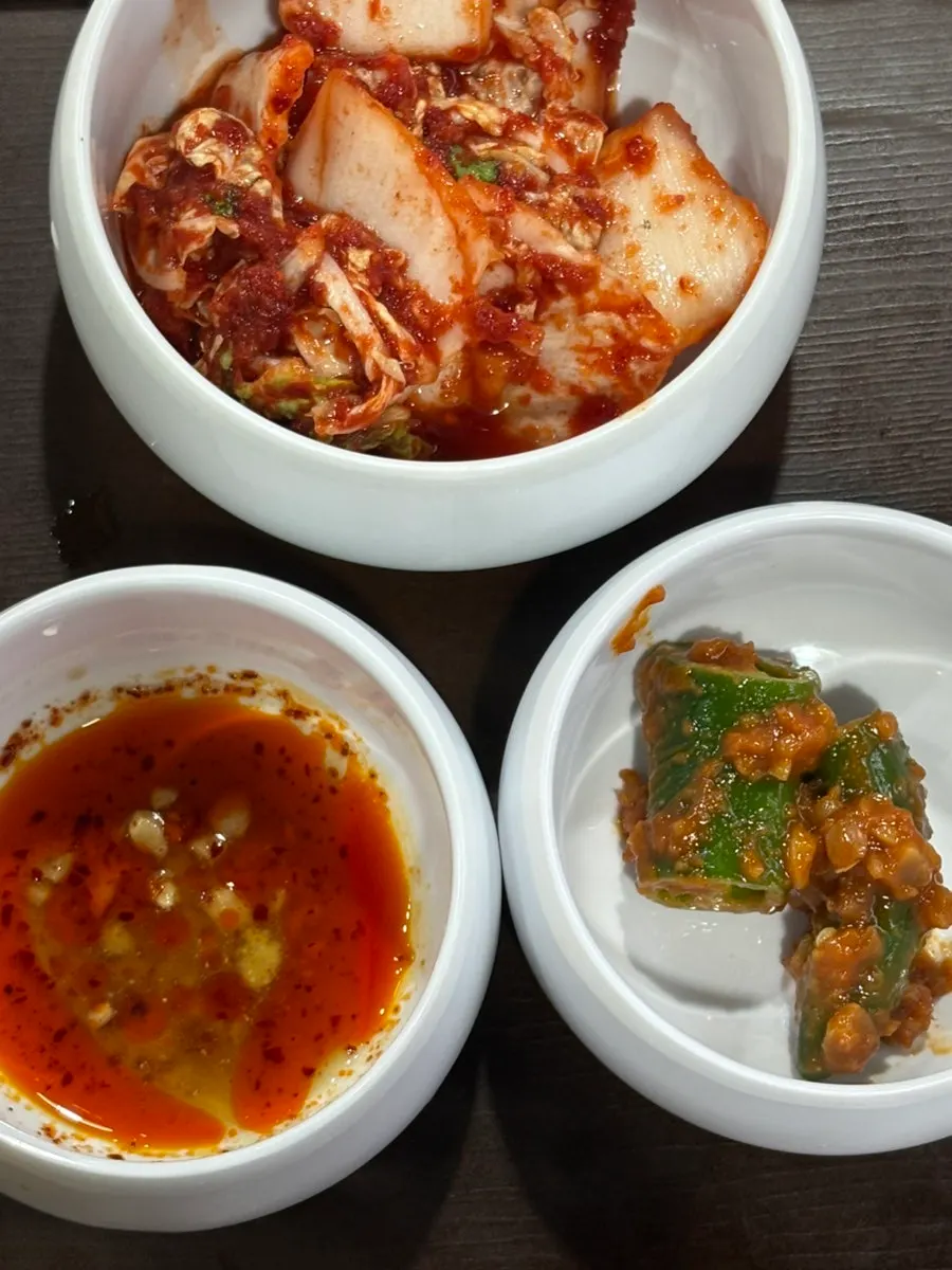 Pork jowl suyuk served on a plate