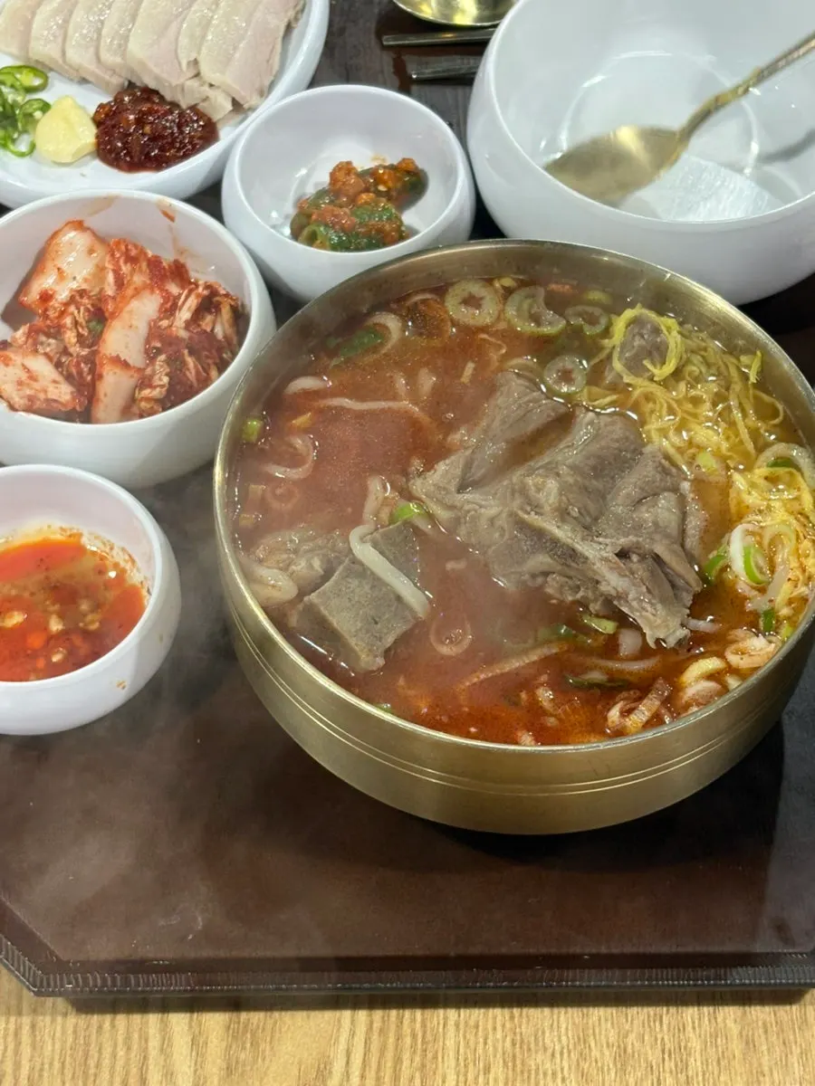 Lean meat picked off the bone with chopsticks