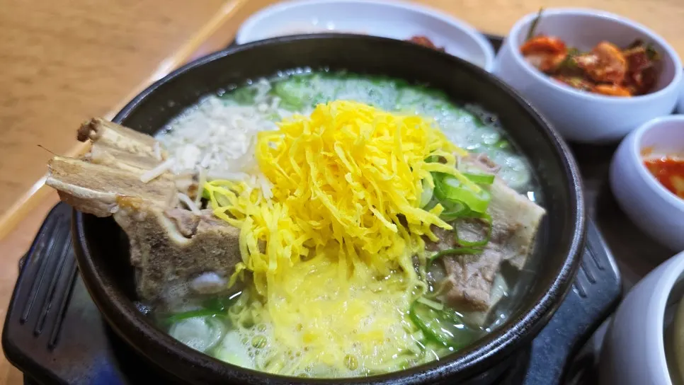 Bone tang-bap broth topped with egg garnish
