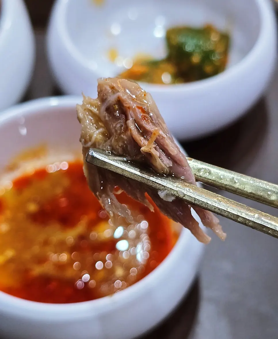 Bone meat dipped in sauce
