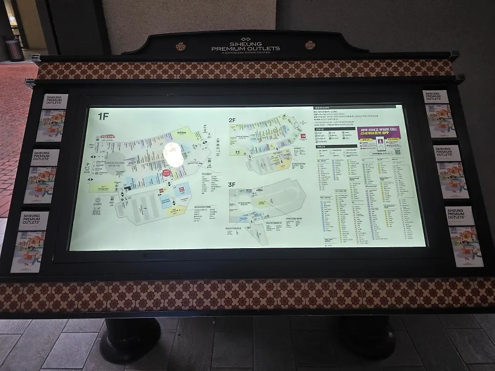 Escalator at the parking entrance and map showing current location