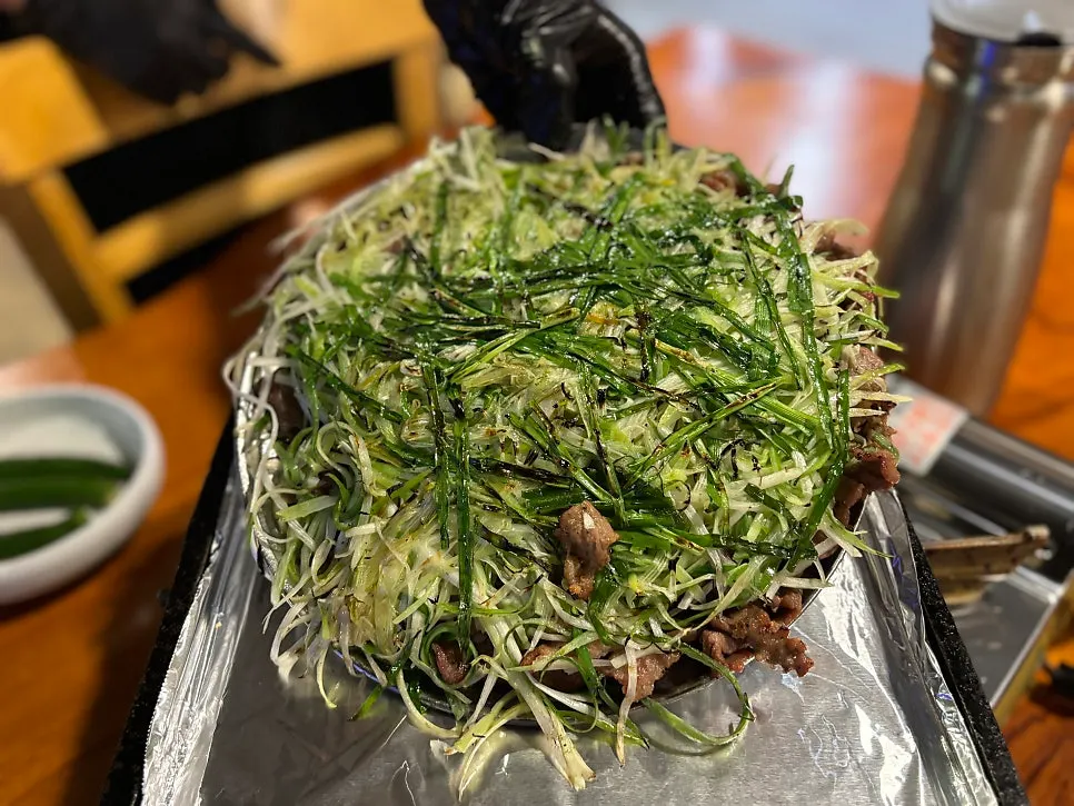 Two servings of smoky charcoal pajeon bulgogi